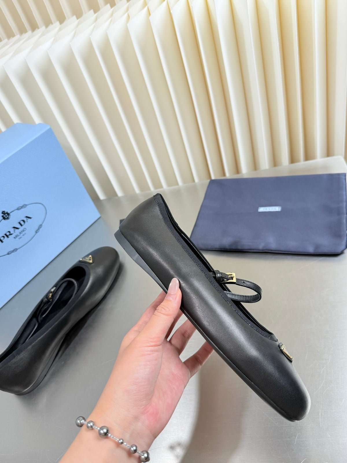 PRADA 26S MARY JANE FLATS IN BLACK CALFSKIN