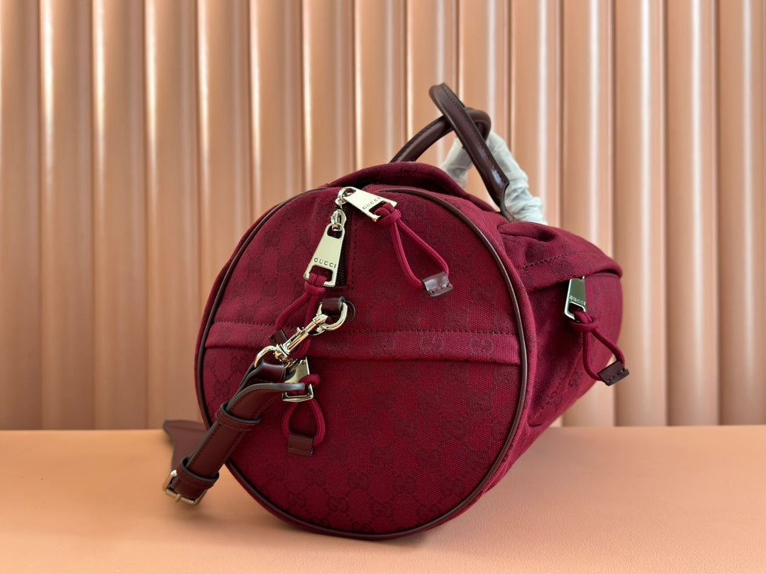 GG SMALL DUFFLE BAG 42 IN ROSSO ANCORA RED GG CANVAS