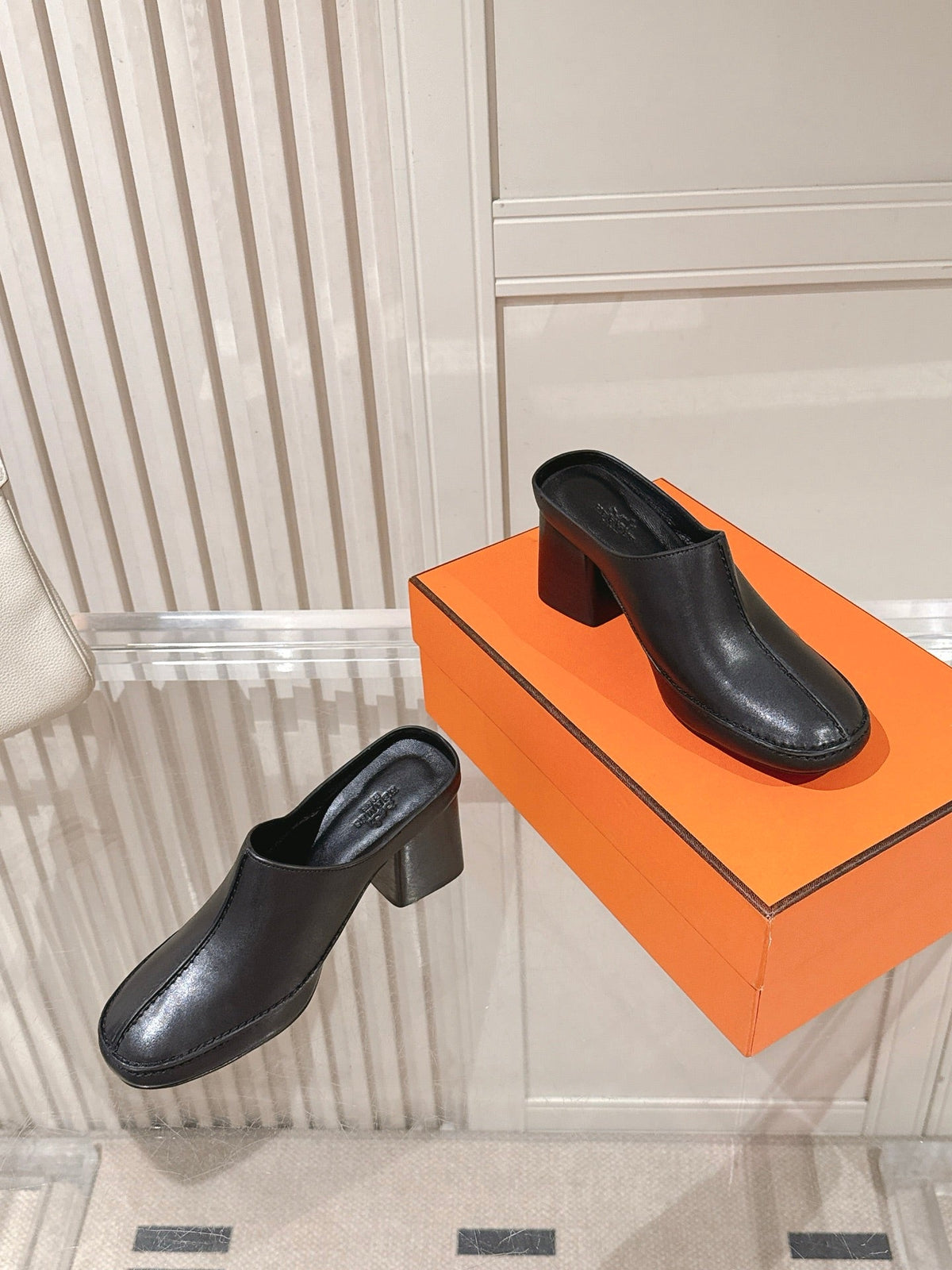 HM 26S HEEL MULES 65 MM IN BLACK CALFSKIN