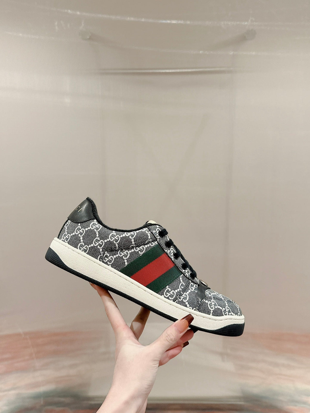 GUCCI 26S SCREENER SNEAKER IN BLACK AND WHITE GG CANVAS