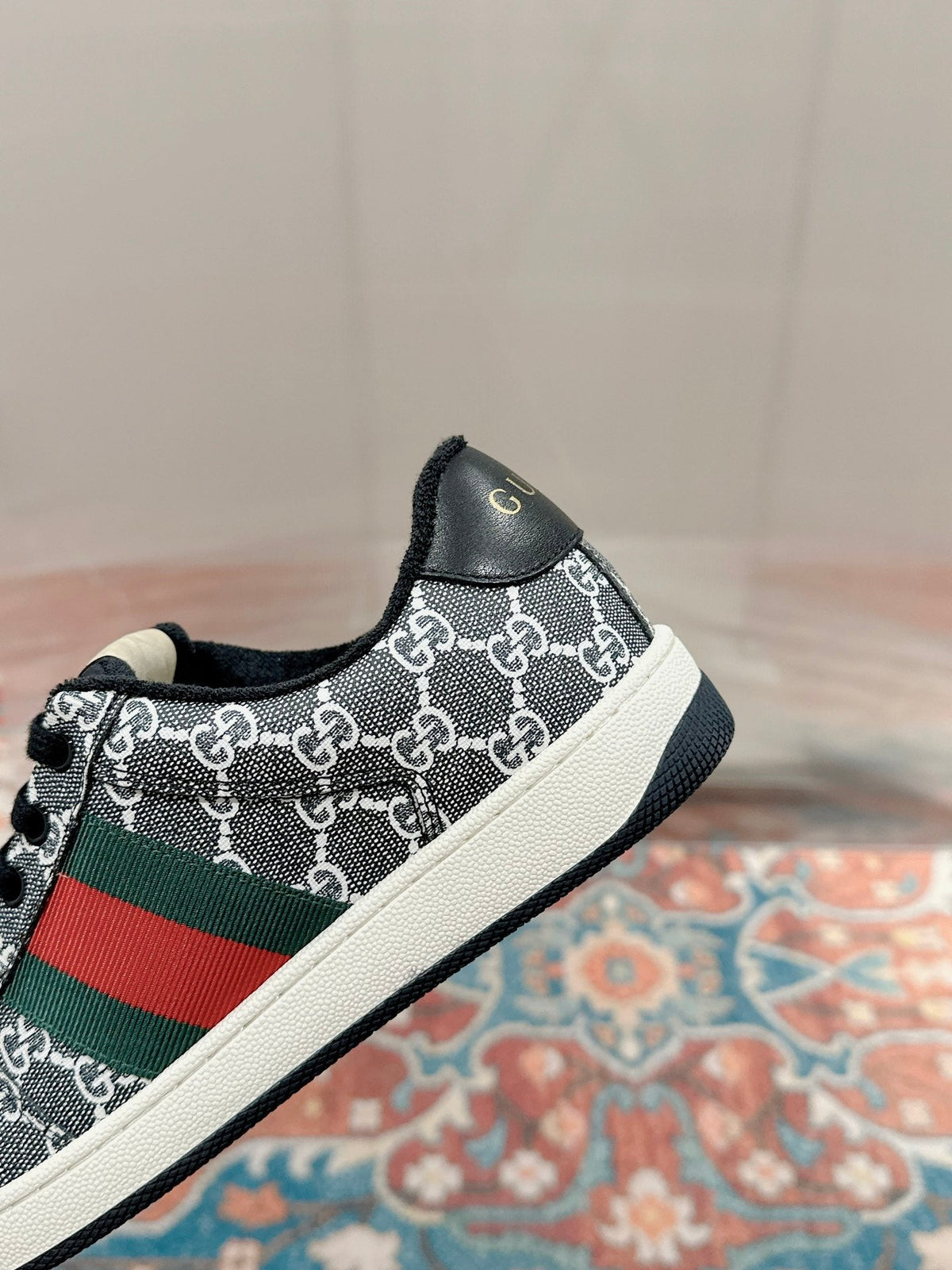 GUCCI 26S SCREENER SNEAKER IN BLACK AND WHITE GG CANVAS