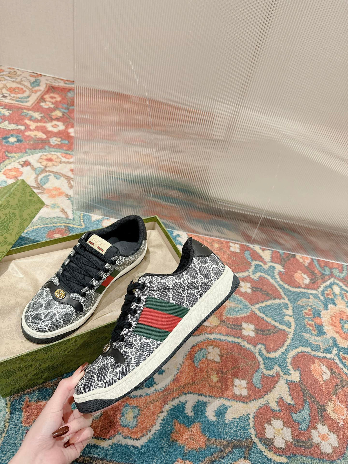 GUCCI 26S SCREENER SNEAKER IN BLACK AND WHITE GG CANVAS