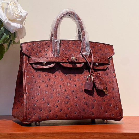 KELLY SELLIER 25 BAG IN BERRY RED OSTRICH LEATHER WITH GOLD HARDWARE