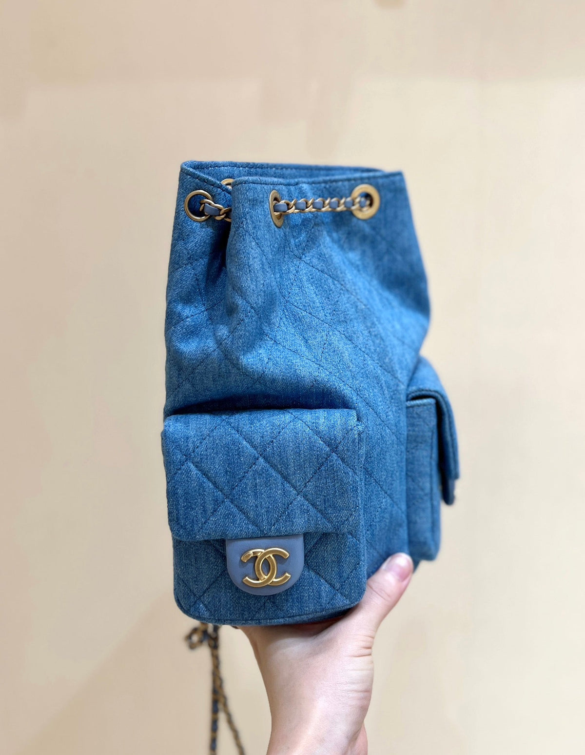 DRAWSTRING BUCKET BACKPACK 24 IN MALIBU BLUE DENIM GOLD HARDWARE