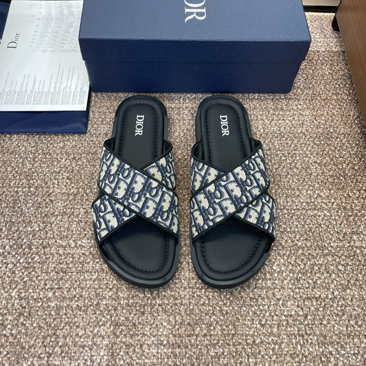 DIOR 25S ALIAS CROSS-STRAP SLIDES IN BLACK CALFSKIN WITH CD OBLIQUE DEEP BLUE LOGO