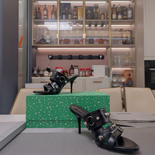 STRAPPY HIGH-HEELED SANDALS IN BLACK STUDDED WAX-OIL SHEEPSKIN